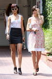 Rihanna shows cleavage and legs in short skirt shopping at Fred Segal in Santa Monica