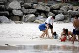 th_06458_Katie_Holmes0_Suri_and_Tom_Cruise_on_the_beach_in_Copa_Cabana_at_Sushi_place_CU_ISA_20_122_992lo.jpg