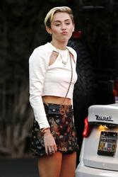 http://img31.imagevenue.com/loc469/th_542592579_Miley_Cyrus_081313_JKERD008_122_469lo.jpg