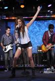 http://img31.imagevenue.com/loc837/th_77084_Ashley_Tisdale_performing_on_Good_Morning_America_in_New_York_City-3_122_837lo.jpg
